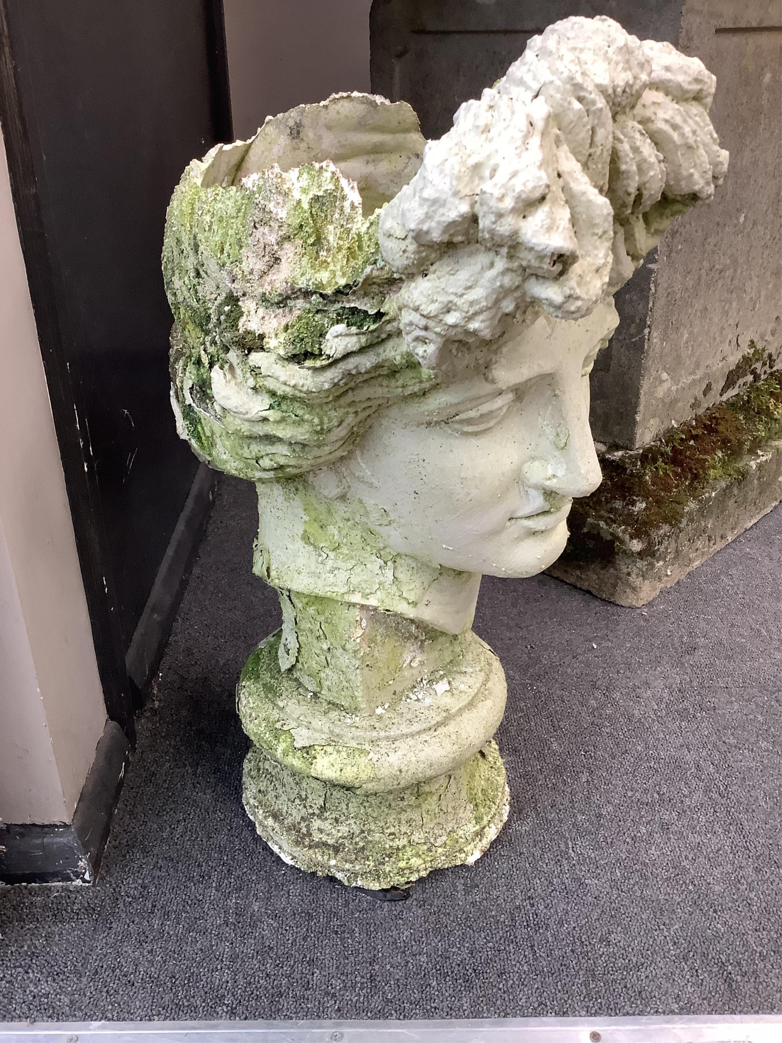 A weathered composition classical head garden urn, height 55cm. Condition - poor